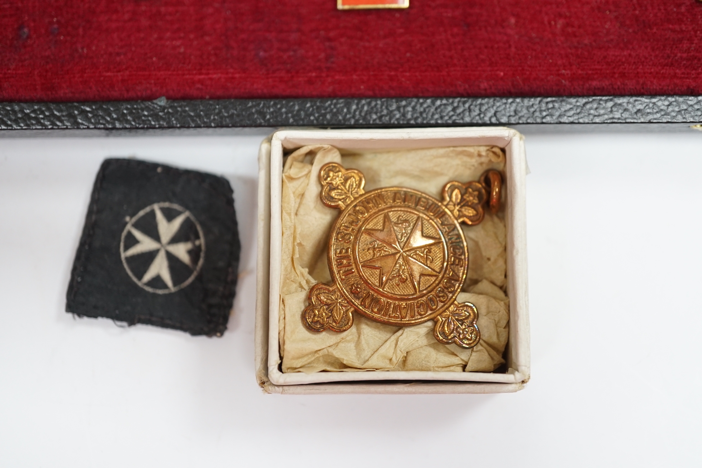 A collection of British Red Cross, etc. medals, awards and memorabilia including medals in original card boxes, a WWII medal group with miniatures including a Voluntary Medical Services Medal, proficiency in first aid me